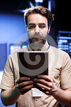 Serviceman in server farm