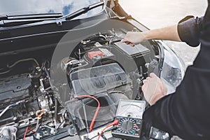 Services car engine machine concept, Automobile mechanic repairman hands repairing a car engine automotive workshop with a wrench