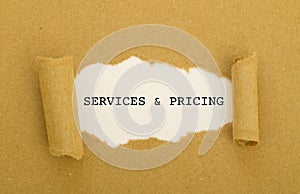 Services and pricing written under torn paper.
