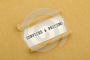 Services and pricing written under torn paper.