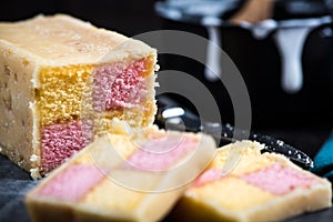 Serving Battenberg checked cake