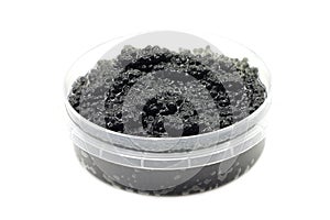 Serving caviar in a plastic container