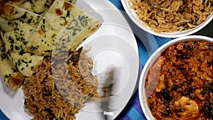 Serving Chicken Saag Masala And Mushroom Rice On A Plate