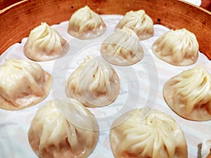 Serving of Chinese Steamed Soup filled Bun Xiaolongbao