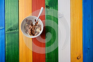 Serving of chocolate ice cream with banan pieces