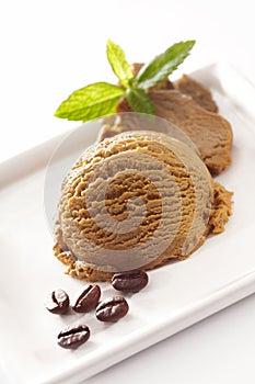 Serving of creamy coffee icecream