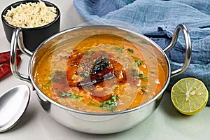 Serving dal tadka dish
