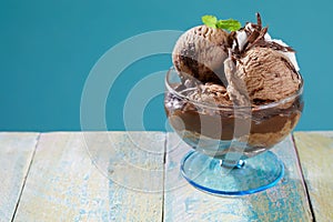 Serving of delicious creamy chocolate ice-cream