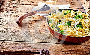 Serving of farfalle pasta with broccoli and cheese