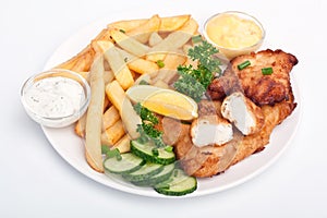 Serving of fish and chips on white background