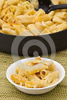 Serving of four cheese rigatoni bake