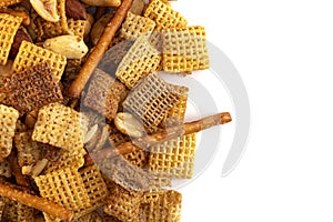 A Serving of Homemade Cereal Nut and Prezel Trail Mix Isolated on a White Background