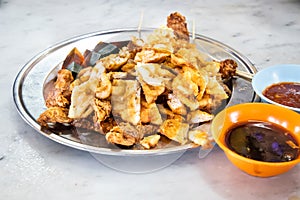 Serving of lobak, popular deep fried delicacy in Penang, Malaysia photo