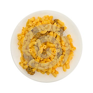 Serving of mac and cheese with hamburger chunks on plate