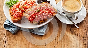 Serving of salsa tostadas and coffee photo