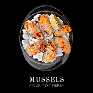 Serving size of baked mussels isolated on black background ready food banner with text space