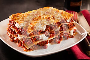 Serving of spicy beef lasagne in a restaurant