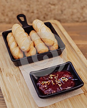 Serving of sticks stuffed with cheese called tequeÃ±os photo