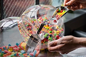 Serving Sweets From Candy Bowl