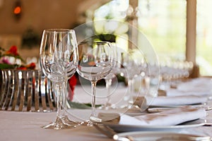 Serving table prepared for event party or wedding. Soft focus, selective focus