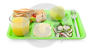 Serving tray with tasty healthy food and juice isolated on white. School dinner