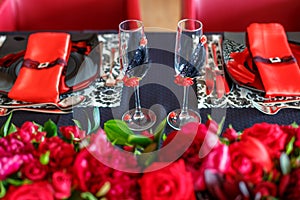 Serving of the wedding table, beautiful festive decor in red