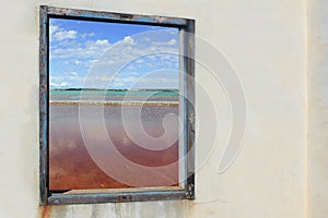 Ses salines formentera view from wooden window photo