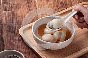 Sesame big tangyuan with syrup soup photo