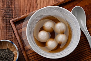 Sesame big tangyuan with syrup soup photo