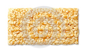 Sesame brittle bar, sesame seed candy bar from above, over white