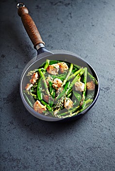 Sesame Chicken with Green asparagus and Sugar Snap Peas flavoured with lemon peel stir fry