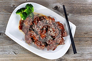 Sesame chicken with vegetables ready to eat photo