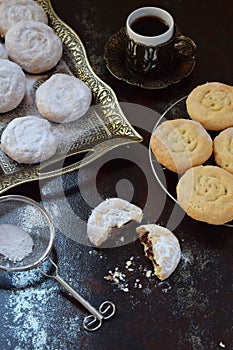 Sesame shortbread with date stuffing. Middle Eastern cookies. Eid and Ramadan Dates Sweets. Kahk. Arabian cuisine. Copy Space