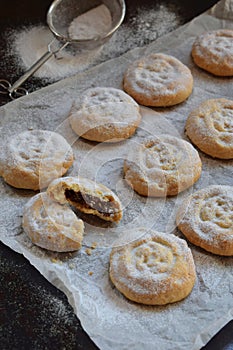 Sesame shortbread with date stuffing. Middle Eastern cookies. Eid and Ramadan Dates Sweets. Kahk. Arabian cuisine. Copy Space