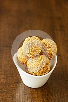 Sesame or til laddoo a Maharashtrian sweet photo