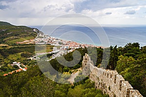 Sesimbra city general landscape seen from Sesimbra castle with the Atlantic ocean far beyond