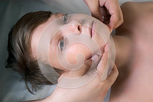 Session of craniosacral therapy, cure of teen boy's jaw by a doctor therapist.