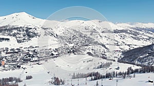 Sestriere Aerial view from drone, famous snow covered ski resort in the italian Alps