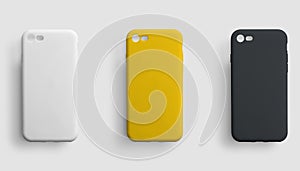Set of 3 cases on a mobile phone in black, yellow and white colors, for design presentation