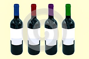 A set of 4 wine bottles with different colored corks. Still life shot for mockup