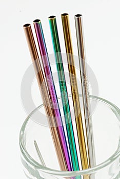 Set of 5 coloured Stainless Steel Straws in glass