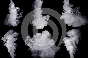 Set of abstract white smoke against dark background