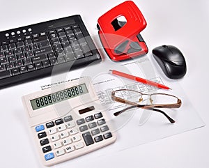 Set for accounting: invoice, keyboard, calculator, mouse, hole punch, glasses and red pen