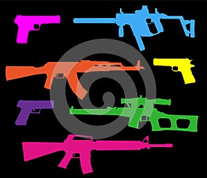 Set of acid color pistols and rifles on a black background in