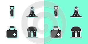 Set African hut, Flashlight, First aid kit and Volcano eruption icon. Vector