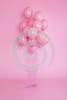 Set of Air Balloons. Bunch of pink color balloons isolated on pink background.