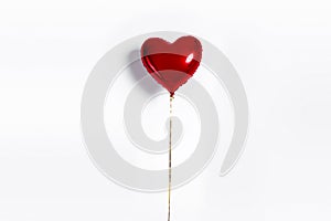 Set of Air Balloons. Bunch of red color heart shaped foil balloons isolated on white background. Love.