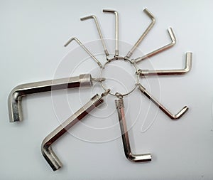 A set of allen key, hex keys, or Hexagonal key also called inbus lock  with a round key chain.