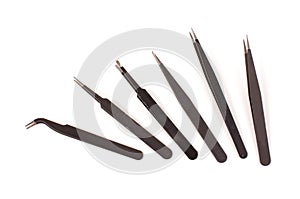 Set of antistatic tweezers isolated on the white background