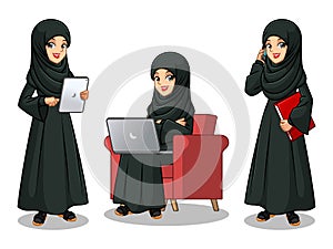 Set of Arab businesswoman in black dress working on gadgets photo